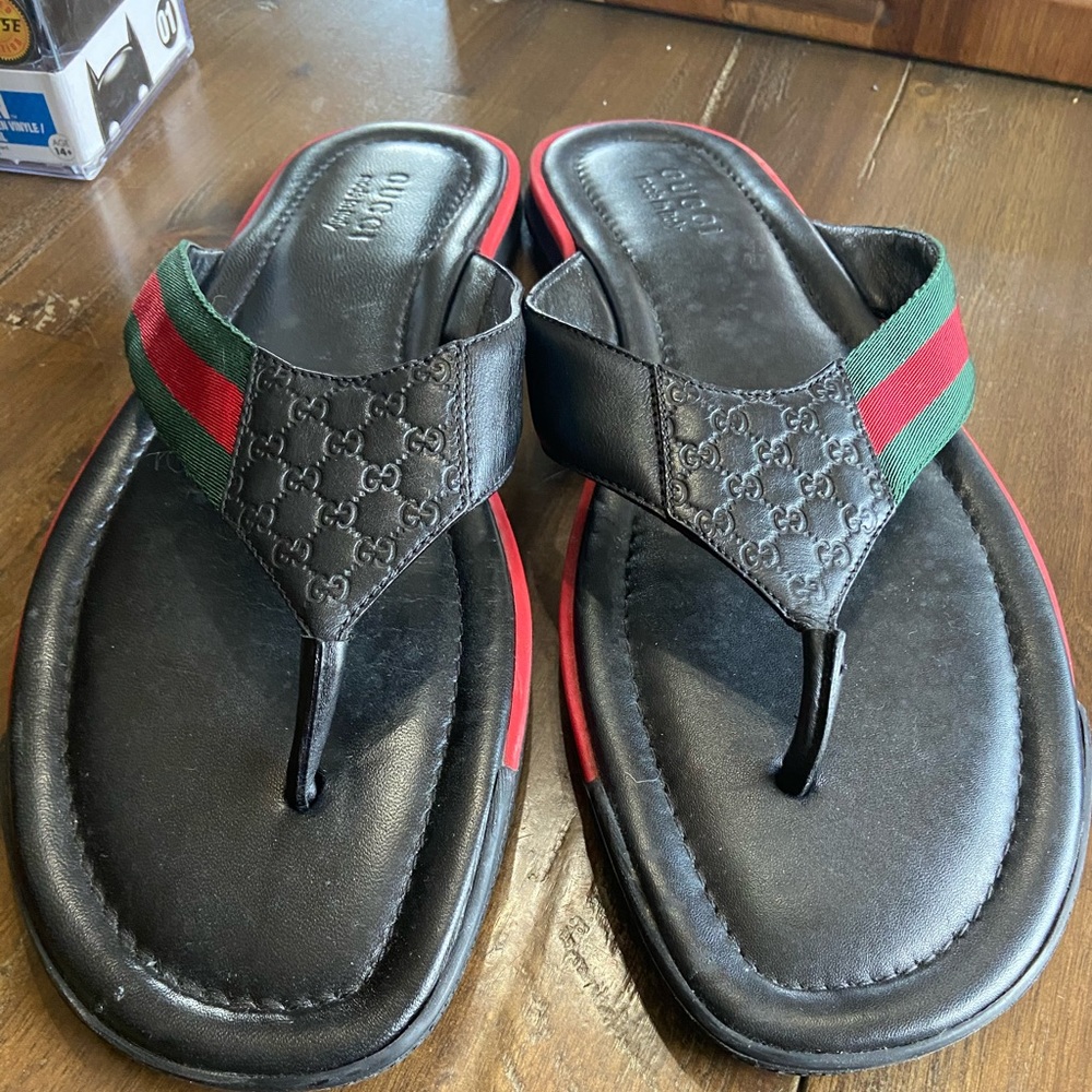 Gucci flip flops, fits like US 13